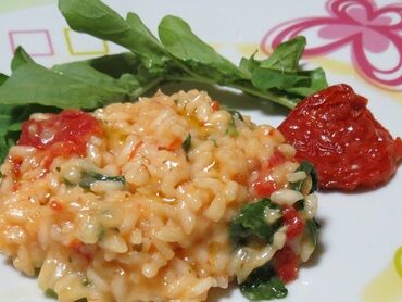 Aprenda a fazer risoto de tomate seco e rúcula Aprenda a fazer risoto de tomate seco e rúcula