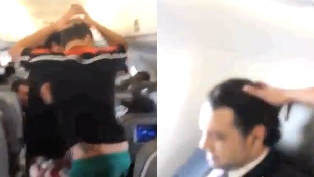 Grupo canta 'Robocop Gay' para deputado Feliciano em pleno voo