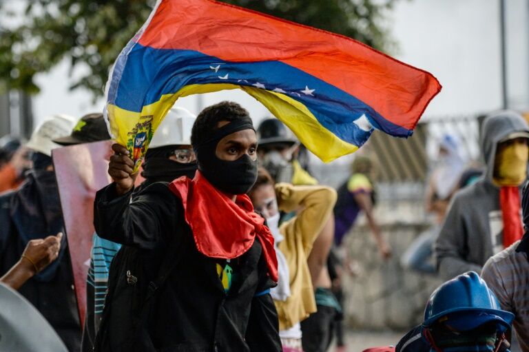 Imagem de protesto de 1º de maio na Venezuela — Foto: Leonardo Fernandez Viloria/Reuters